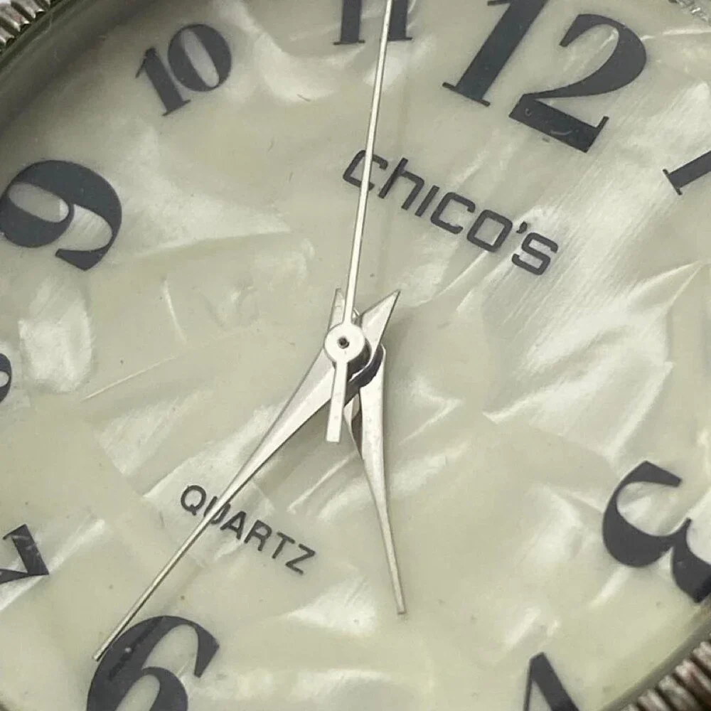 CHICO’S Women's Quartz Watch with Beige Snake-Print Leather Strap. It has a styl